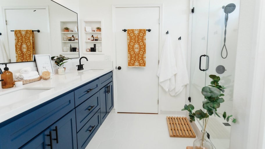 white bathroom with blue vanity